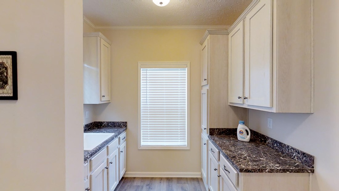 The 2917 HERITAGE Utility Room. This Manufactured Mobile Home features 4 bedrooms and 2 baths.
