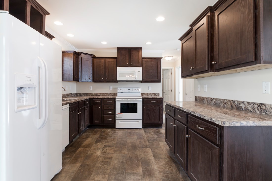 The 2089 52X28 3+2 HERITAGE Kitchen. This Manufactured Mobile Home features 3 bedrooms and 2 baths.